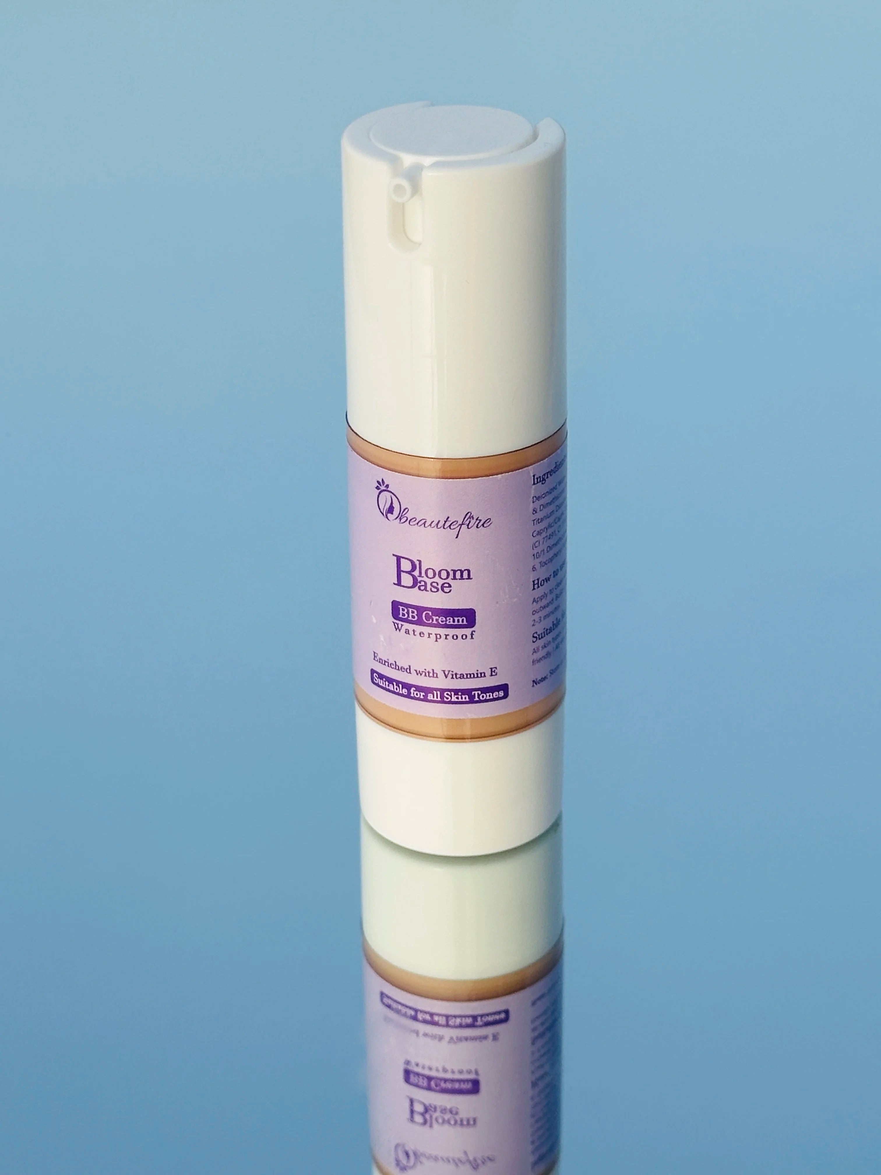 Beautefire Bloom Base BB Cream on mirror ā luxury skin-perfecting makeup with a smooth radiant finish.