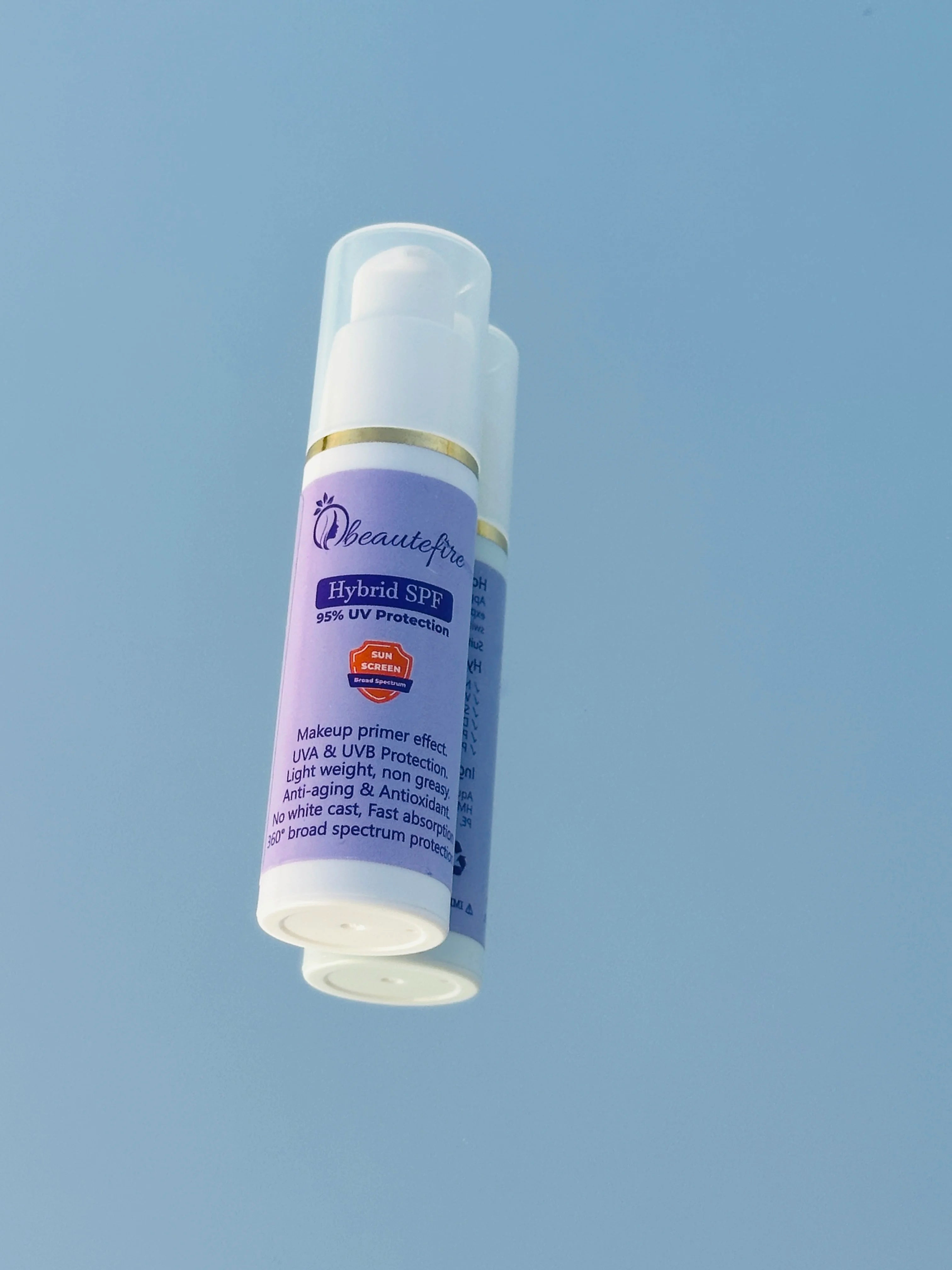 Beautefire Hybrid SPF on mirror āpremium sunscreen reflecting clean, luxury skincare design.