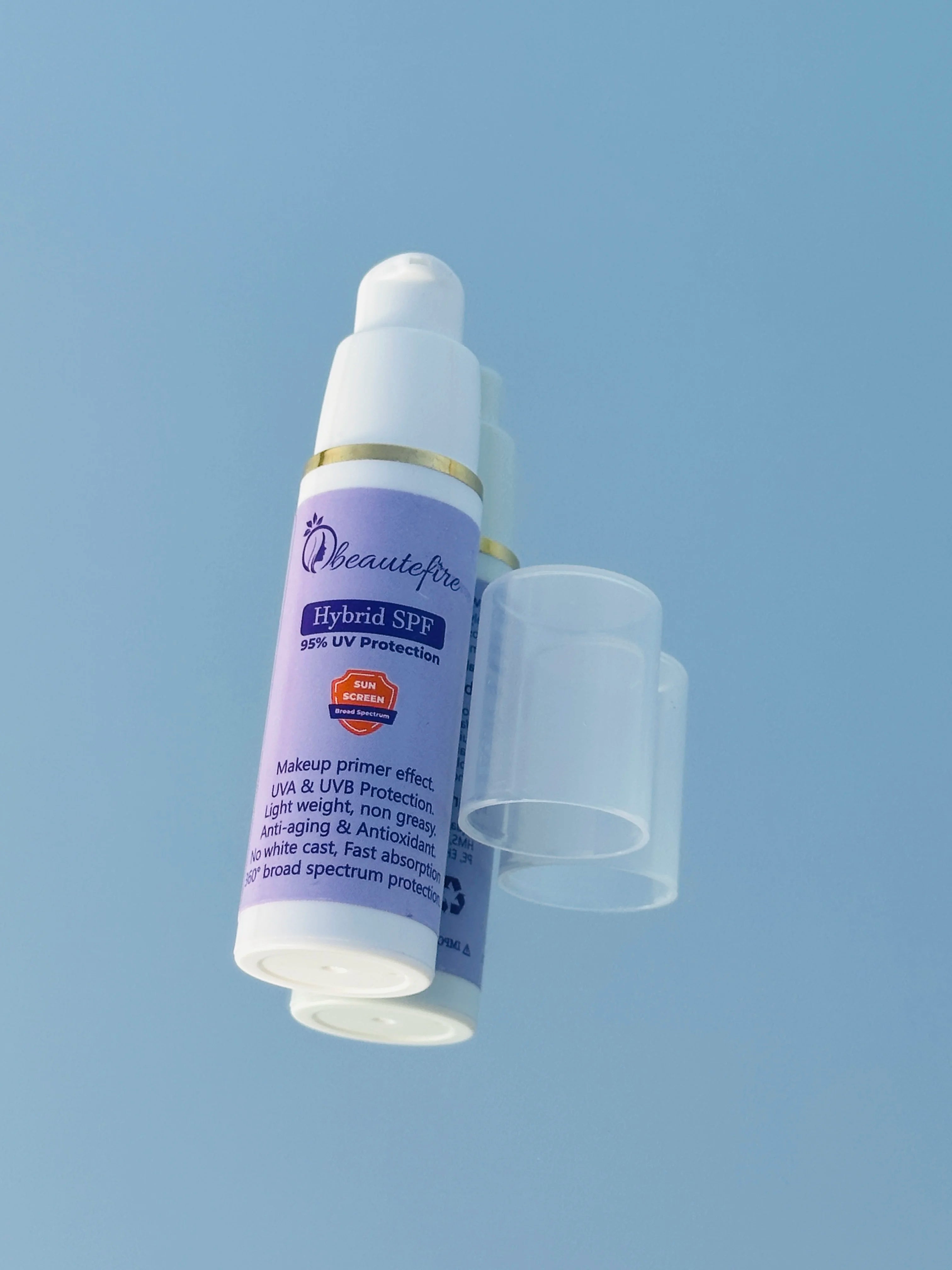 Beautefire Hybrid SPF on mirror ā premium sunscreen reflecting clean, luxury skincare design.