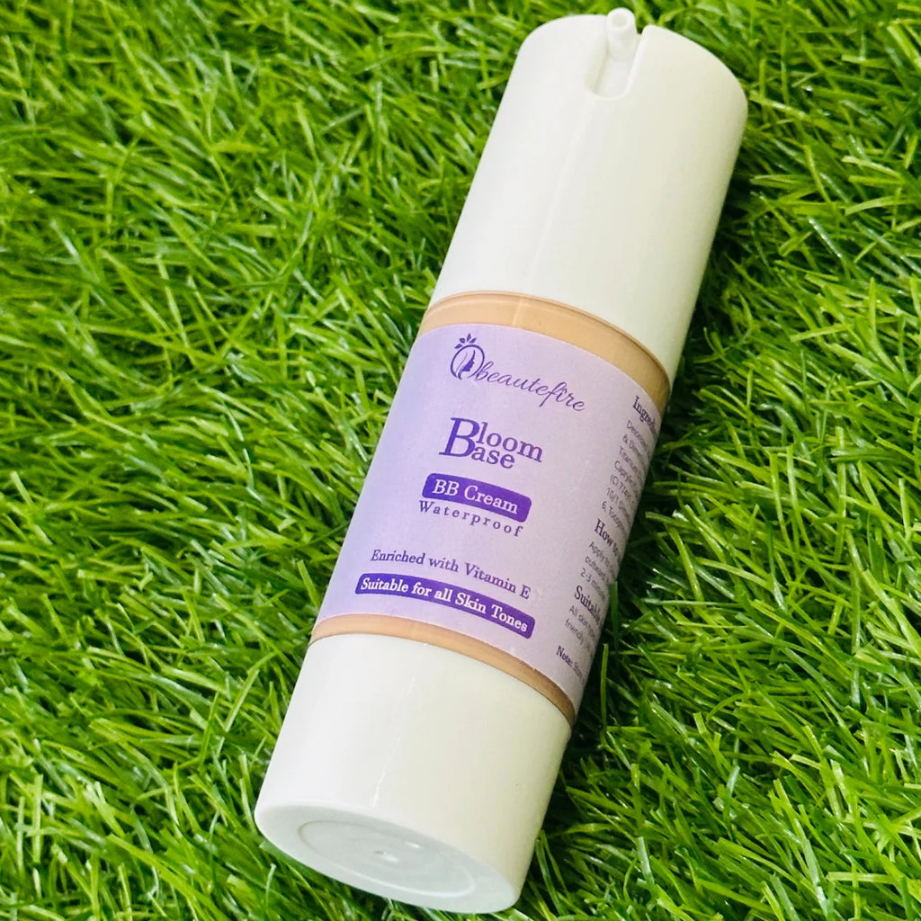 Beautefire Bloom Base BB Cream on grass and mirror — natural flat lay highlighting radiant, breathable skincare-makeup blend.