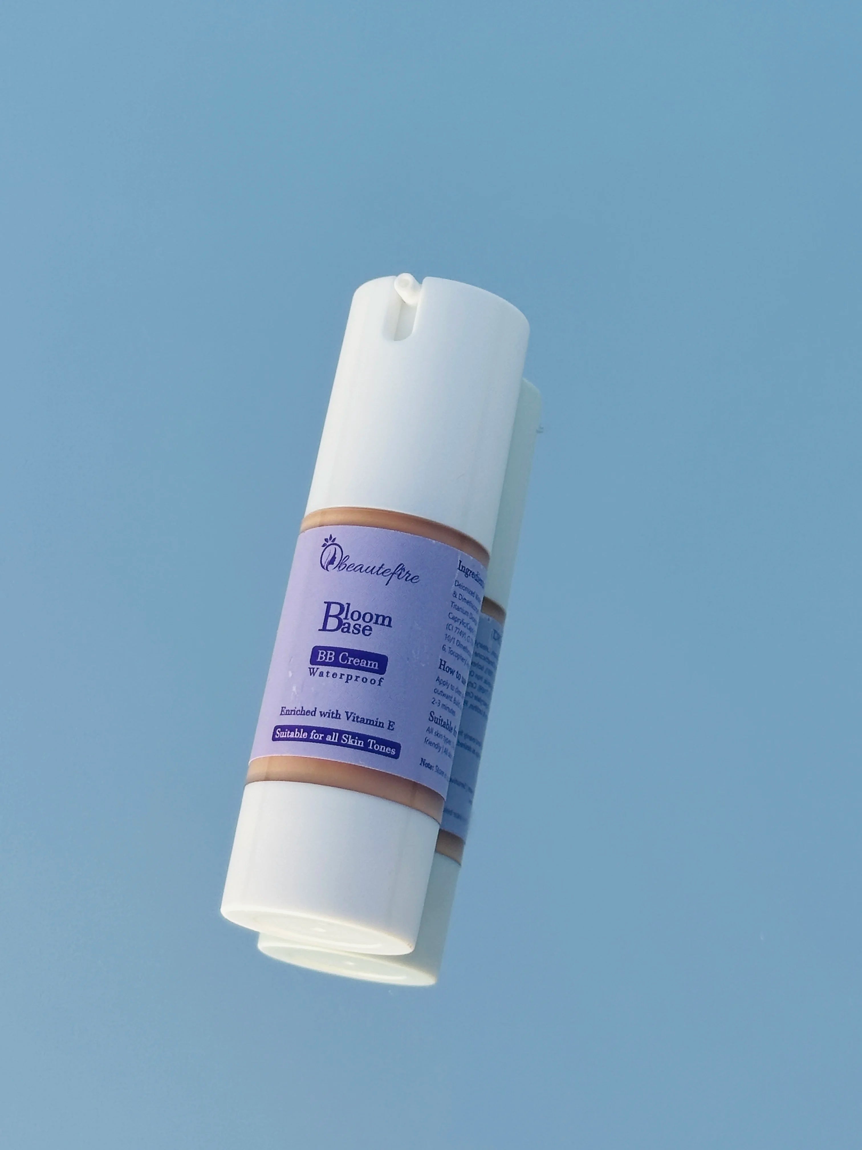 Beautefire Bloom Base BB Cream on mirror — luxury skin-perfecting makeup with a smooth radiant finish.