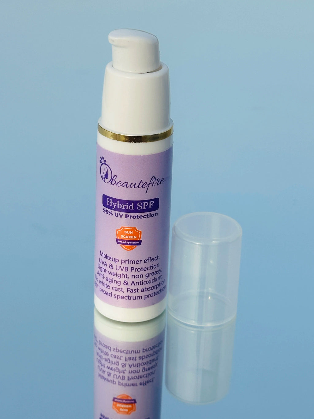 Beautefire Hybrid SPF on mirror — premium sunscreen reflecting clean, luxury skincare design.