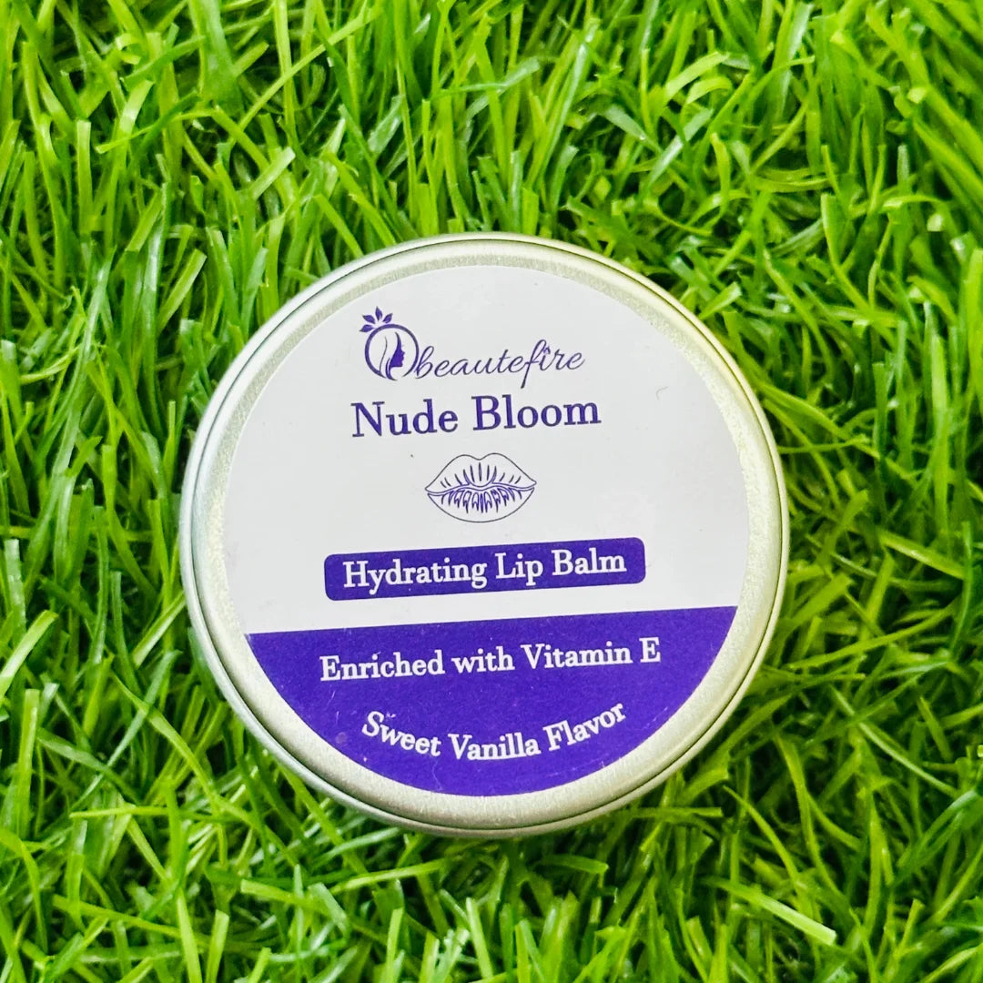 Beautefire Nude Bloom Lip Balm on grass — natural daylight shot highlighting nourishing, non-sticky lip care for daily use.