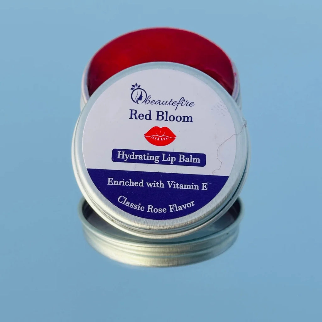 Beautefire Red Bloom Lip Balm on mirror — luxury hydrating balm that restores damaged lips naturally.