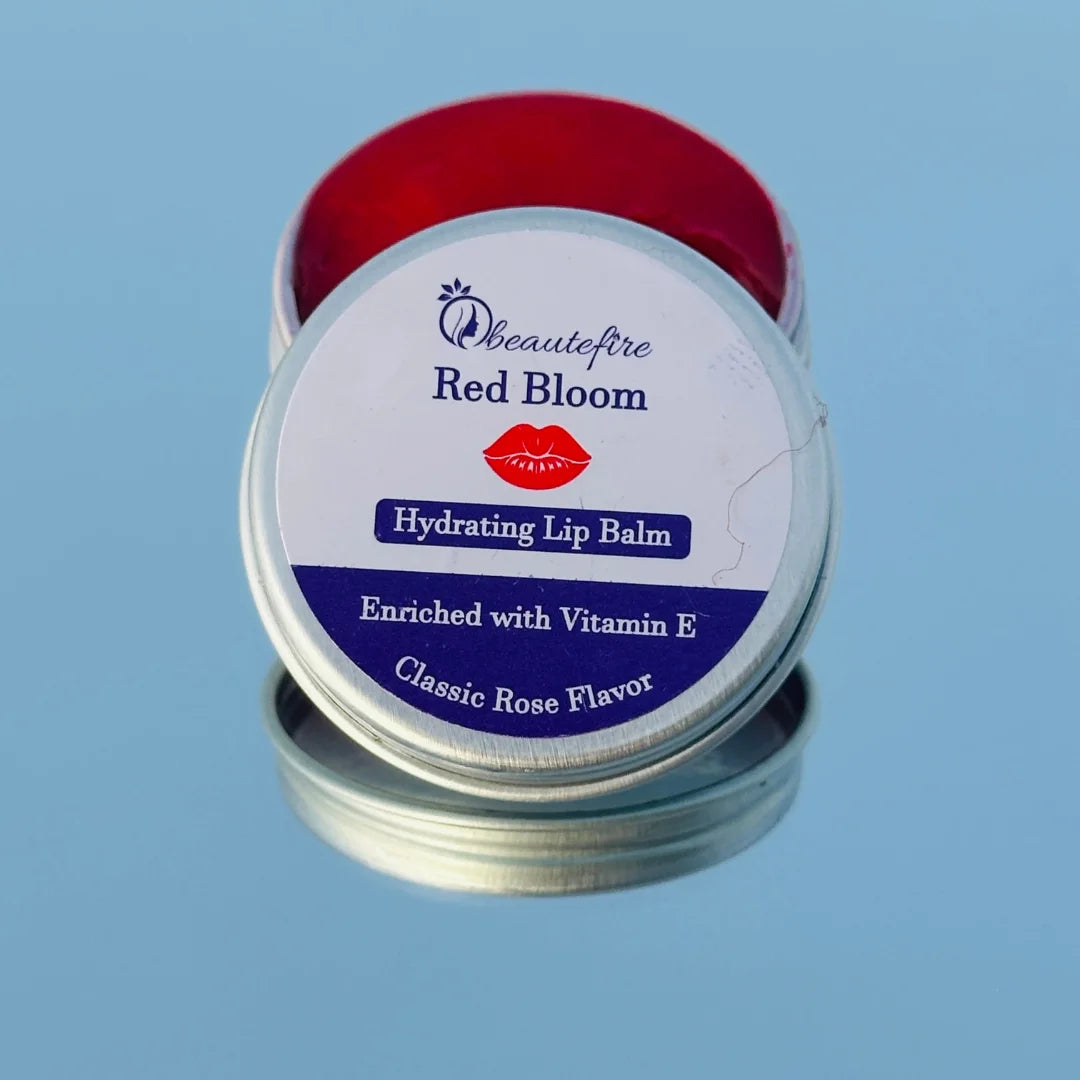 Beautefire Red Bloom Lip Balm on mirror — luxury hydrating balm that restores damaged lips naturally.