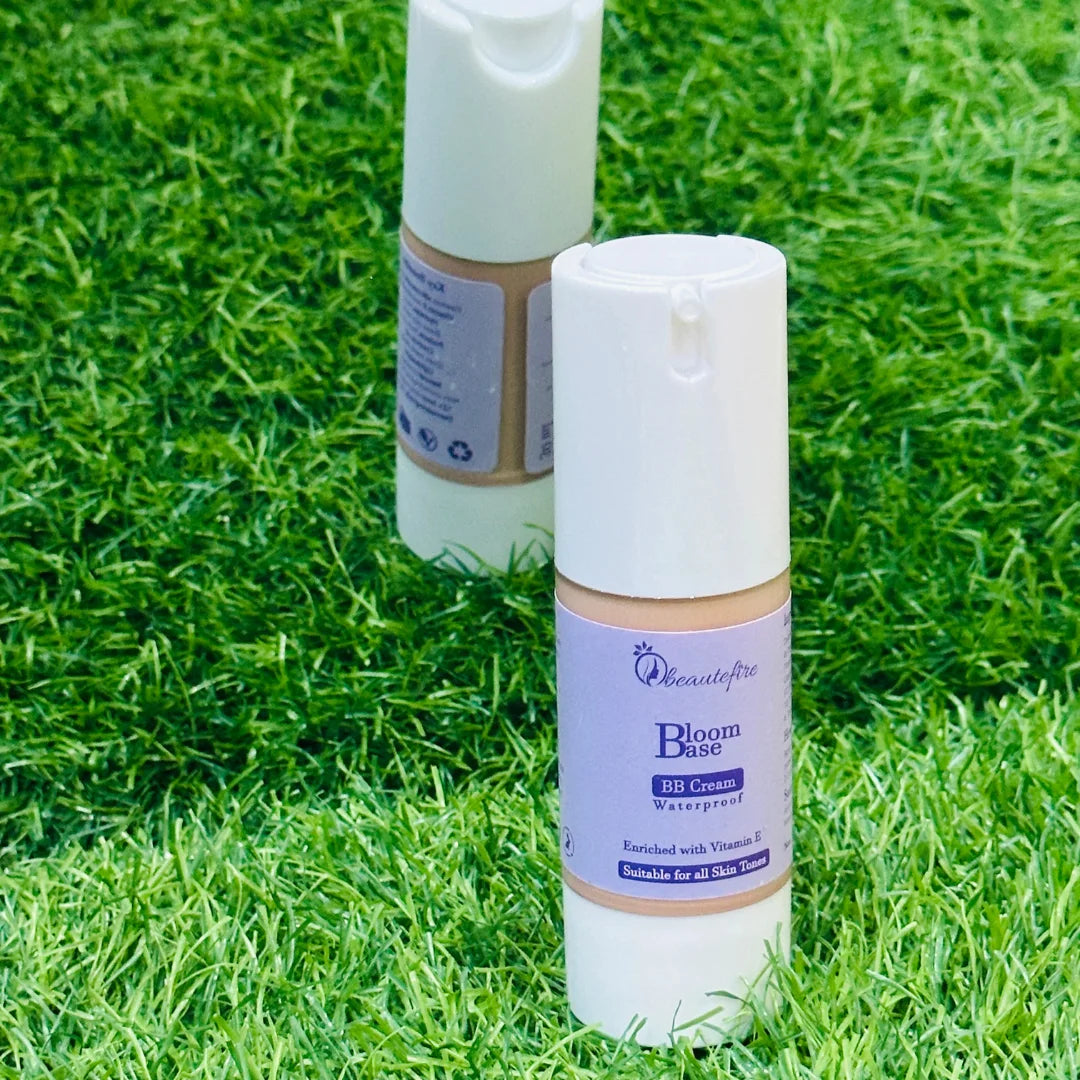 Beautefire Bloom Base BB Cream on grass and mirror — natural flat lay highlighting radiant, breathable skincare-makeup blend.