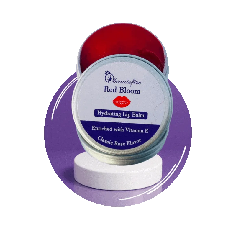 An open Red Bloom lip balm tin on a white stand in front of a lilac circle