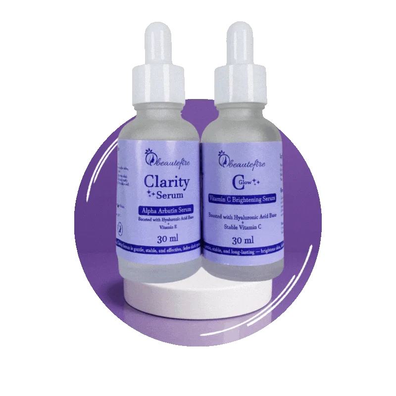Beautefire Clarity and C Glow serum bottles on a white stand in front of a lilac circle